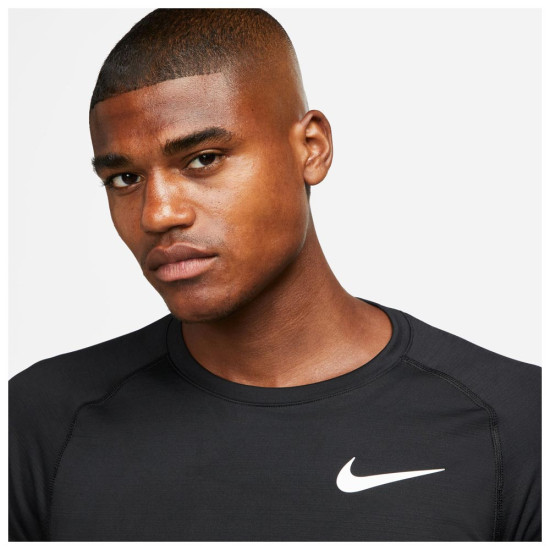 Nike Ανδρική μακρυμάνικη ισοθερμική μπλούζα Top Warm Nike Ανδρική μακρυμάνικη ισοθερμική μπλούζα Top Warm